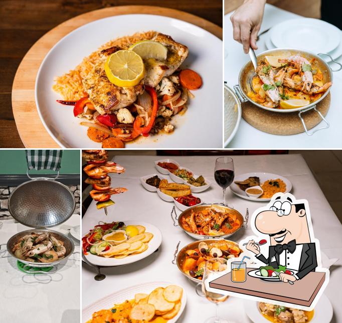 Grilled fish, seafood cataplana and a generous table spread
