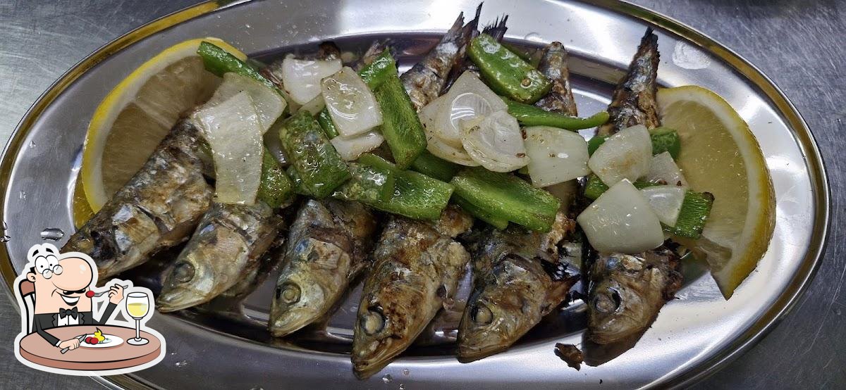 A table spread of Portuguese dishes